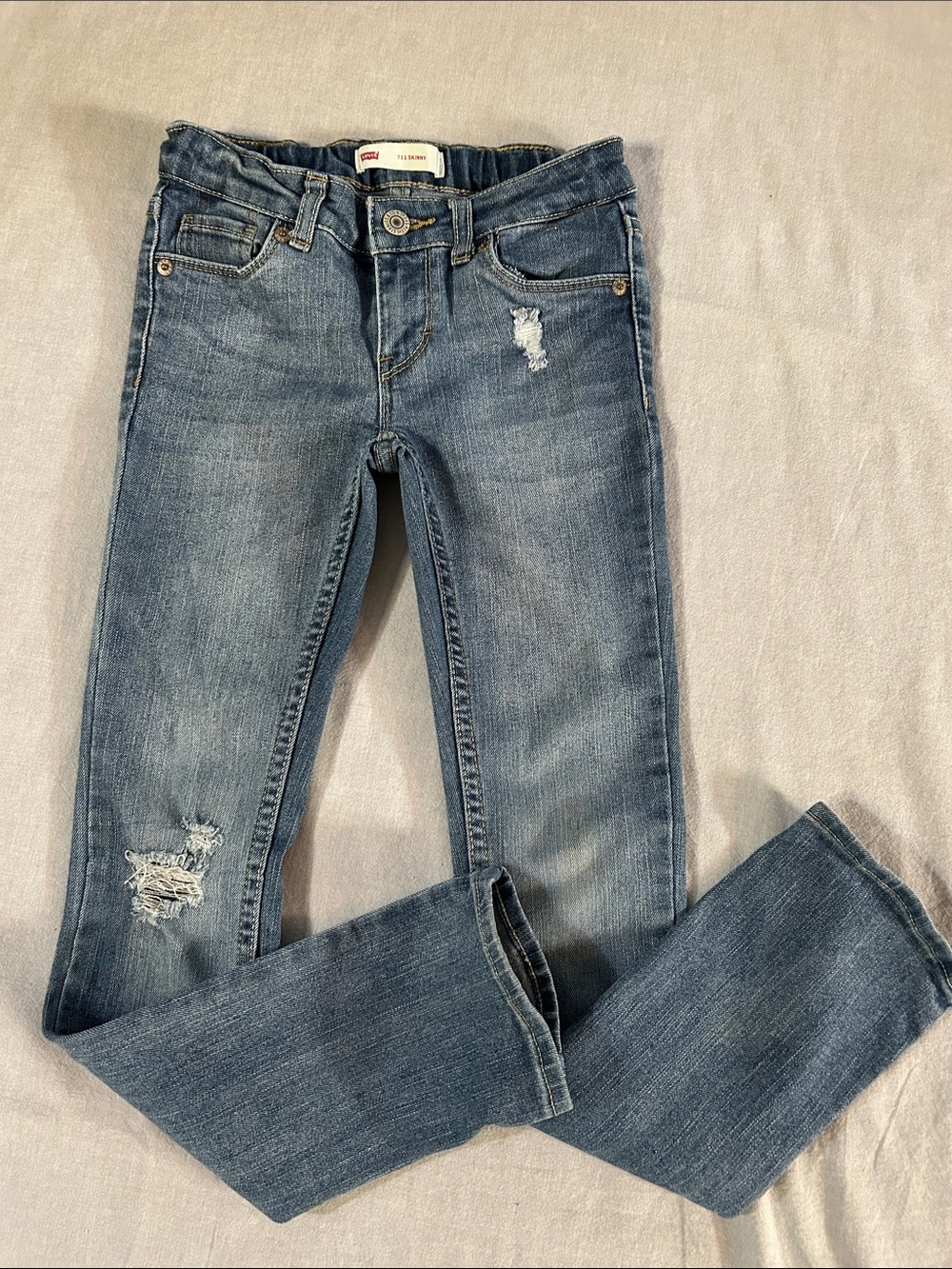 Levi's 711 Girls' Skinny Faded Blue Distressed Jeans in Stretch Denim